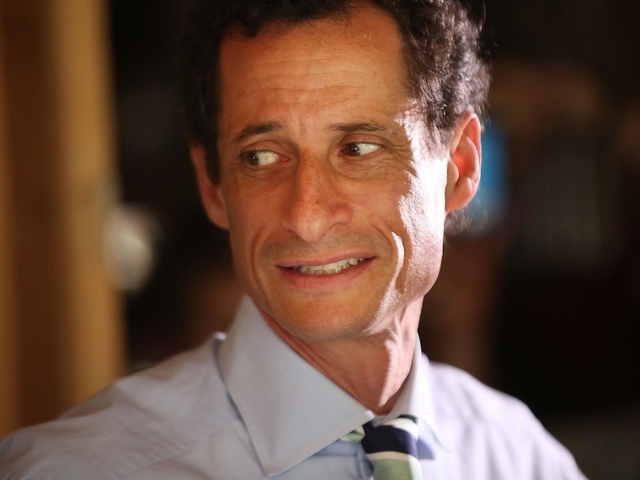 Clinton aide separates from scandal-plagued Weiner