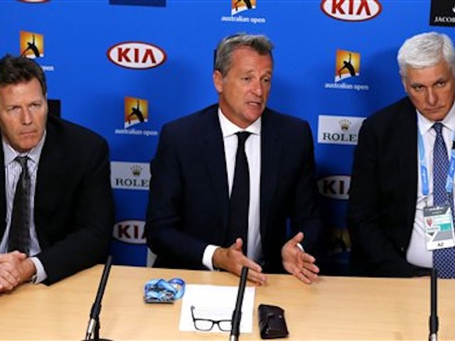 Tennis officials interview players after match