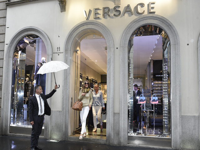 Former Versace employee sues company over security codes targeting black people