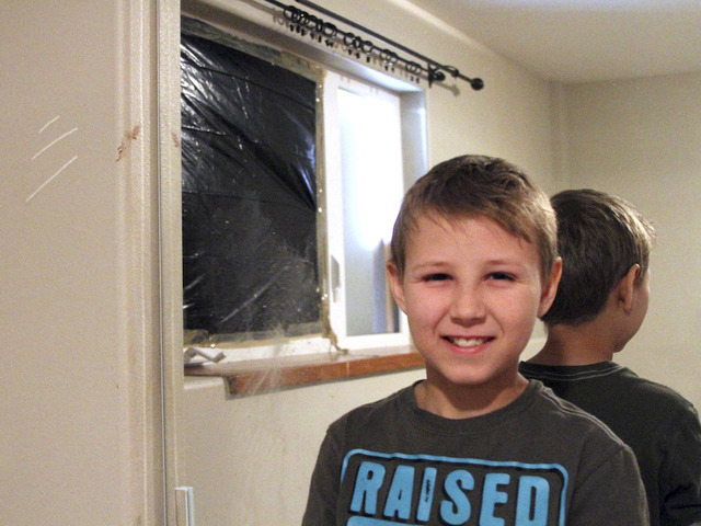 Bear breaks through window into Alaska boy's bedroom