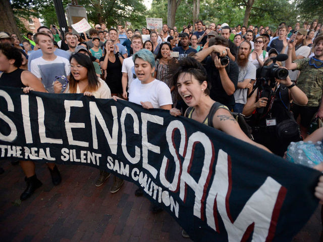 Photos: Protesters topple Confederate statue at University of North Carolina at Chapel Hill
