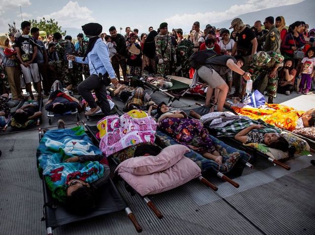 Indonesia tsunami and earthquake: Rescuers race to aid victims as death toll passes 840