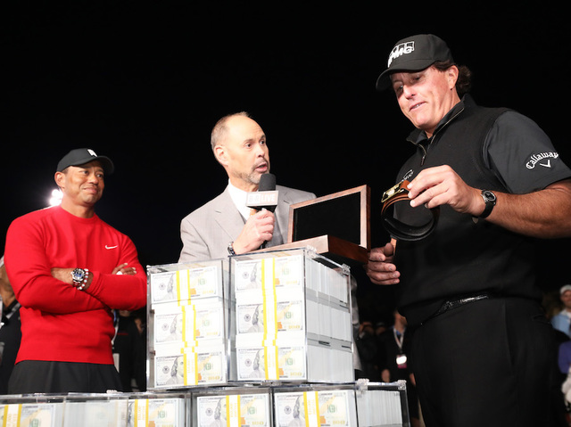 Phil Mickelson edges Tiger Woods to win $9M golf event — and the bragging rights to go with it